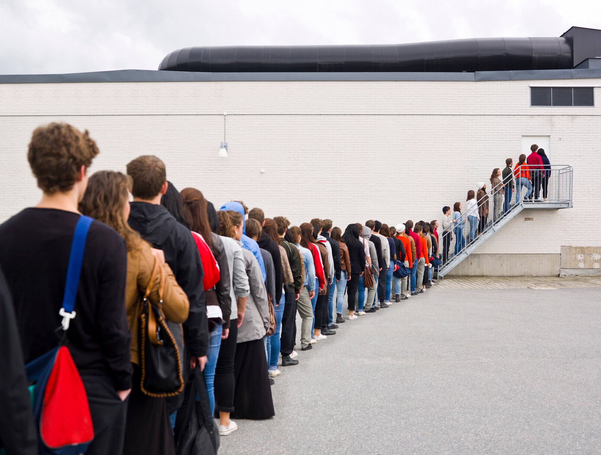People standing in a long line